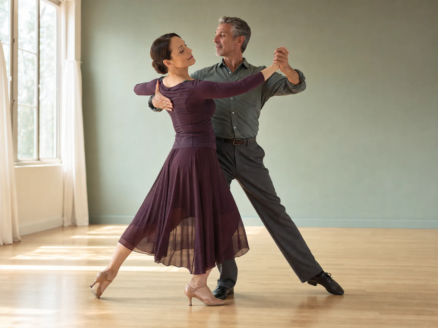 Adult partners practicing a graceful Bolero line