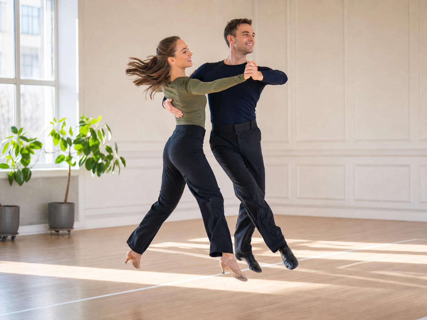 Partners moving through an energetic Quickstep